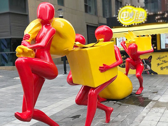 Abstract shopping sculpture side angle with colored shopping bags